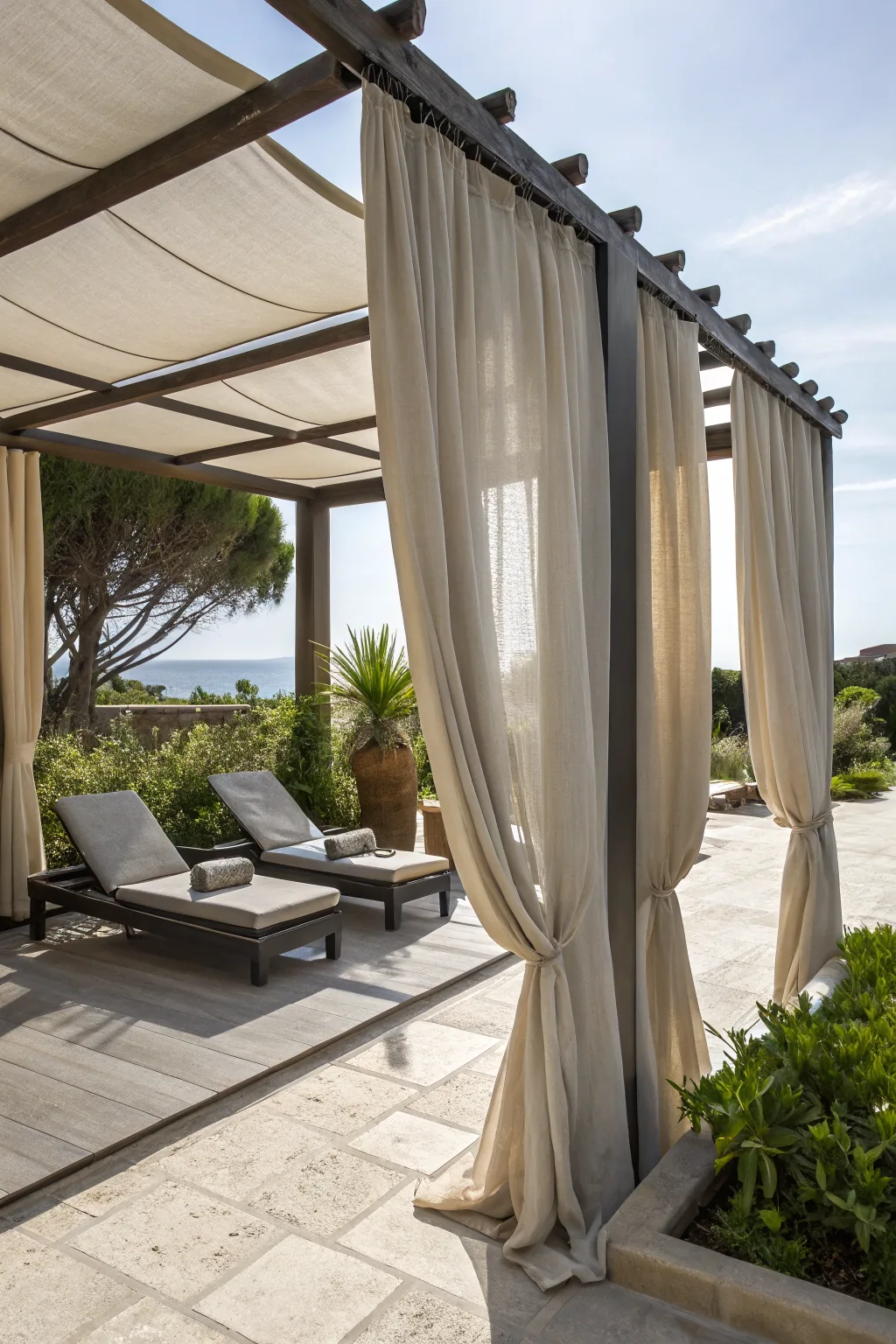 Sheer outdoor curtains adding privacy and drama