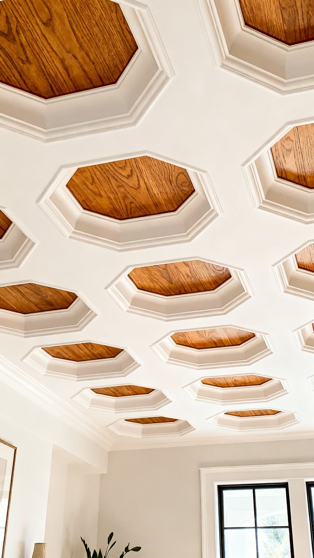 Sculptural Coffered Ceiling With Warm Wood Inlays