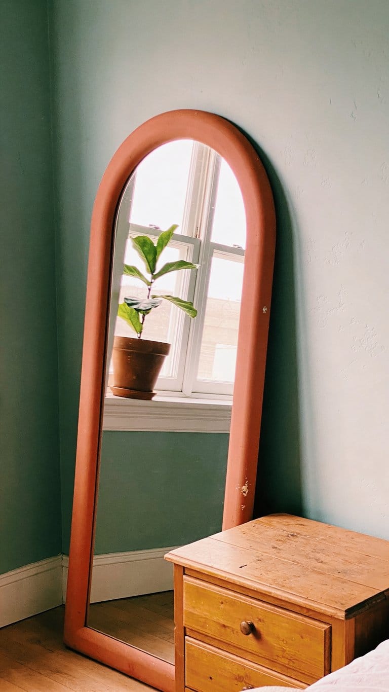 Sage green and terracotta bedroom idea 23