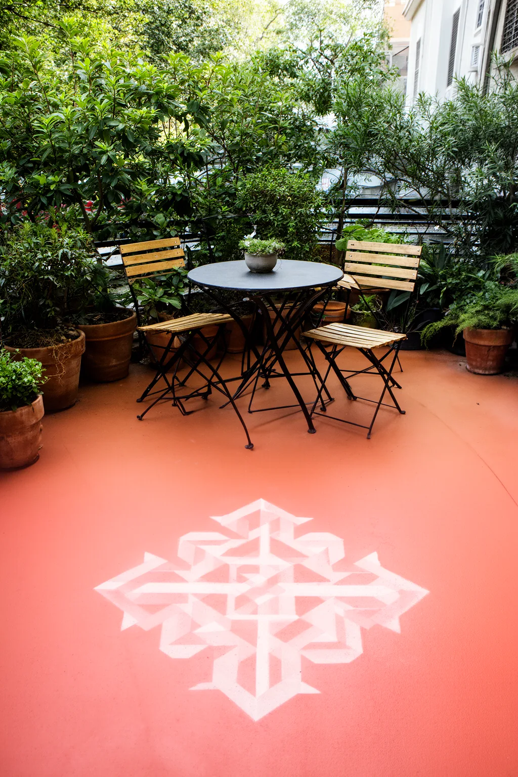 Painted terracotta concrete patio floor