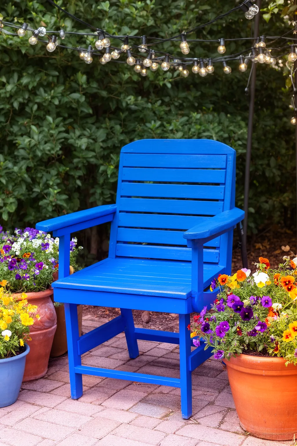 Cobalt blue upcycled outdoor chair on patio