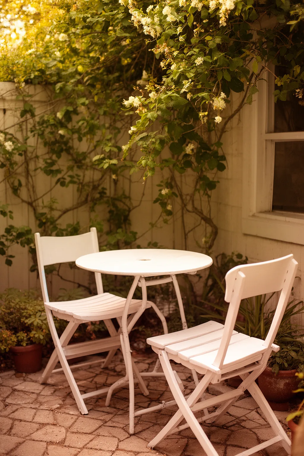 White painted bistro set small patio