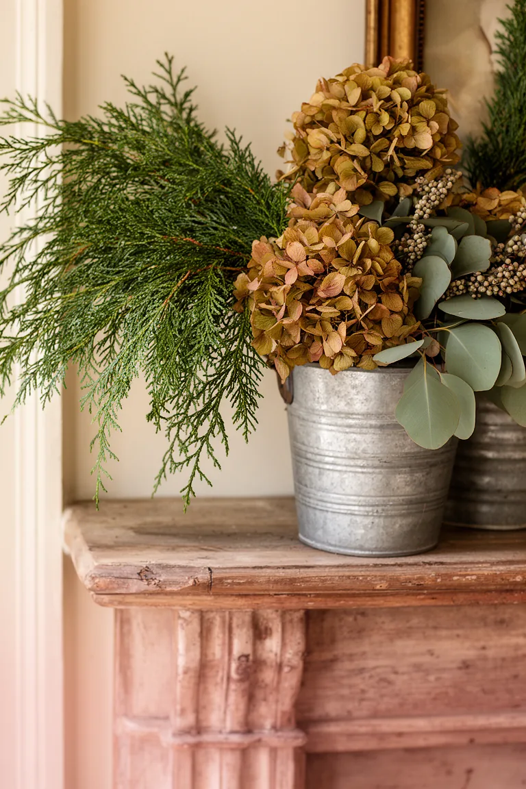 Natural textures and greenery on a rustic vintage mantel variation 4