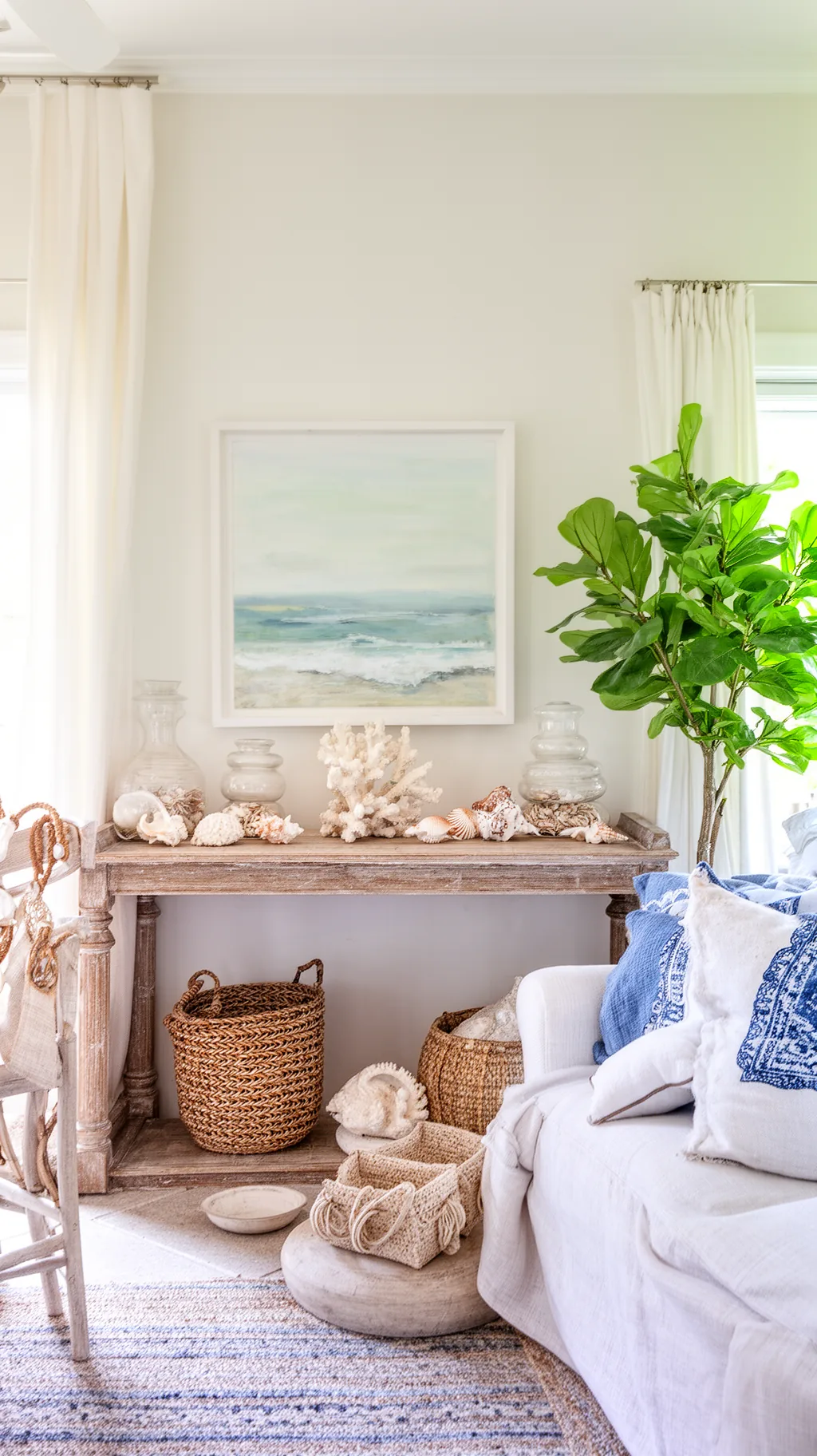 Summer living room mantel styled with light, natural decor (1 of 5)