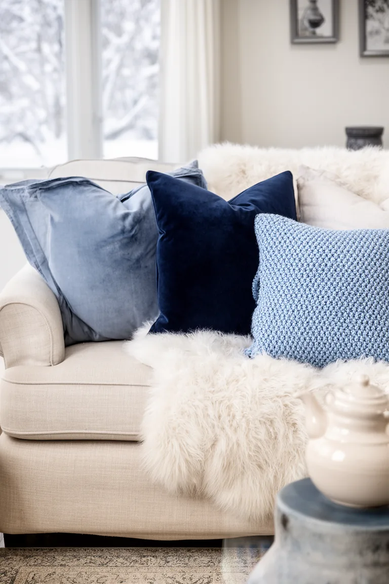 Linen sofa with navy velvet and white faux fur in winter blue and white