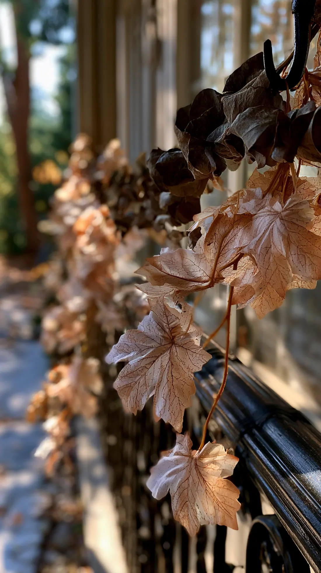 A fall porch garland hung from weatherproof outdoor hooks, photo 3 of 3