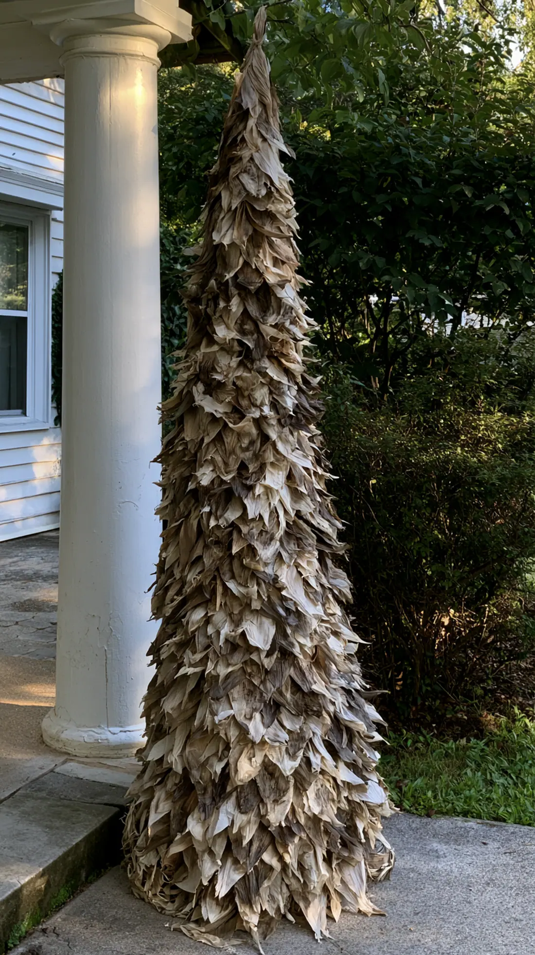 A cone-shaped corn husk topiary built around a hidden PVC frame, photo 4 of 4